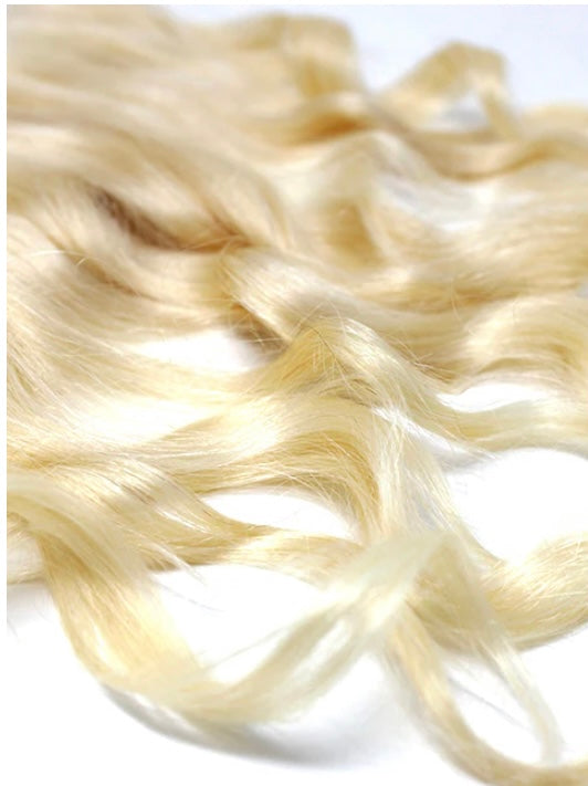 Our Virgin Brazilian 613 Blonde Frontals are made up of 100% premium virgin hair, with beautiful, soft, thick strands and a natural luster. Our 13x4 lace frontals are carefully handcrafted with a natural density and customizable lace giving you an undetectable, straight-from-your-scalp look when installed.